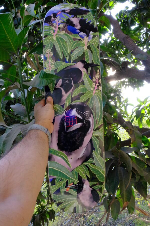 The murder deck held up to the mango tree that inspired it